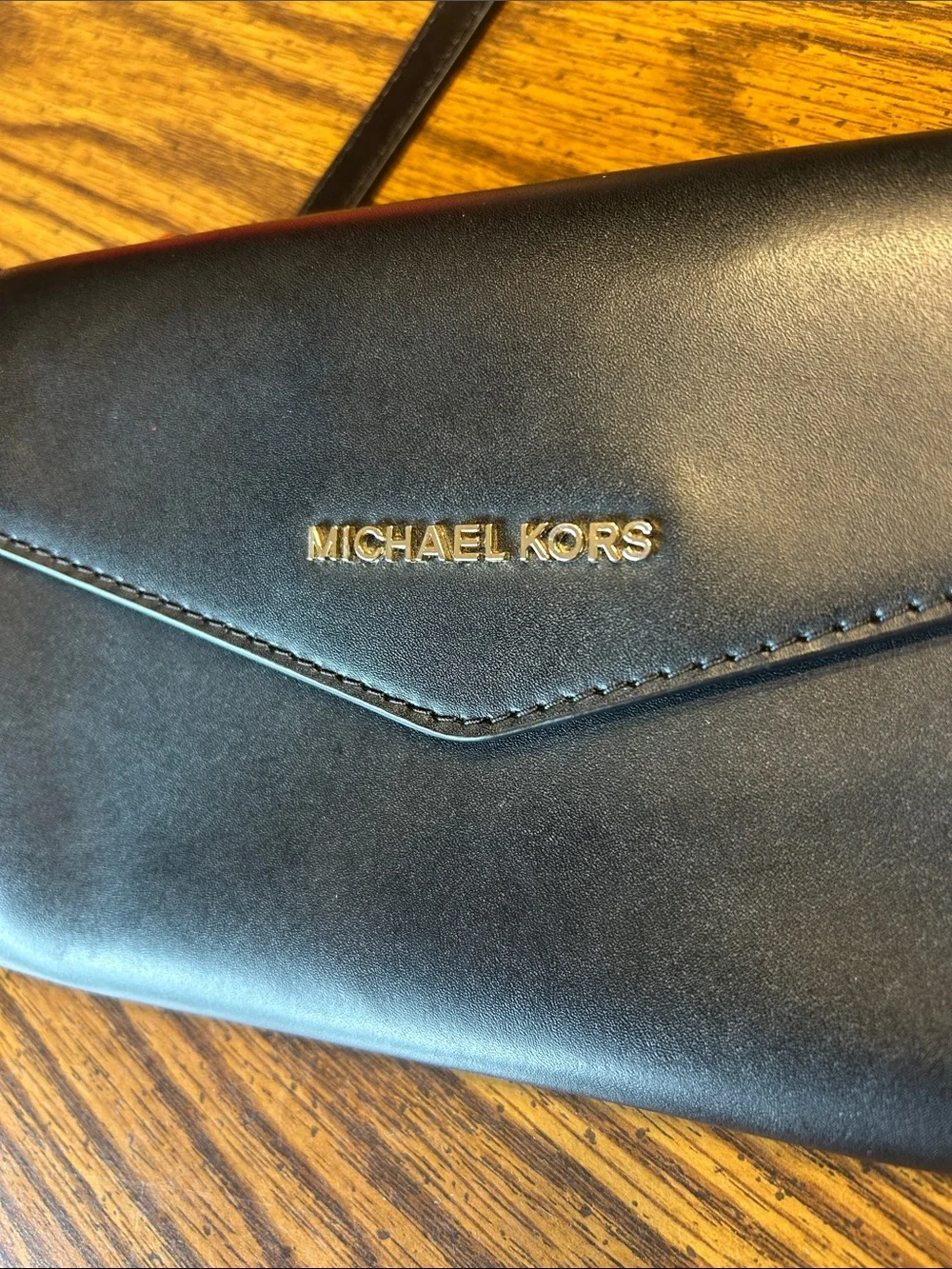 Michael Kors Black Leather Envelope Crossbody with Gold Tone Logo